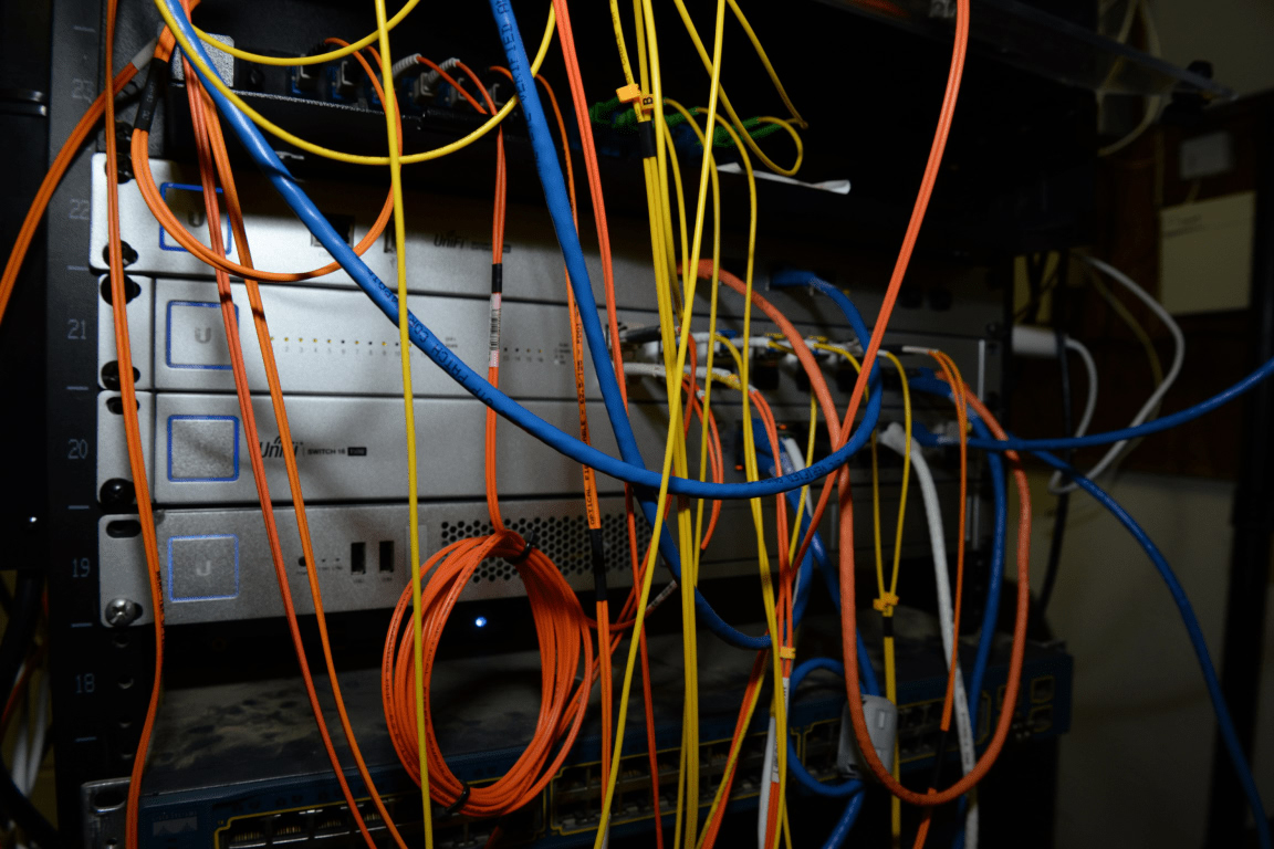 Bundles of network cables routed into a patch panel